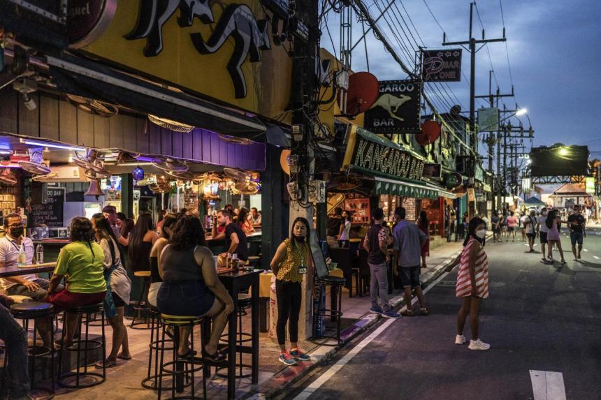 Thailand begins to reopen bars, pubs to woo back tourists