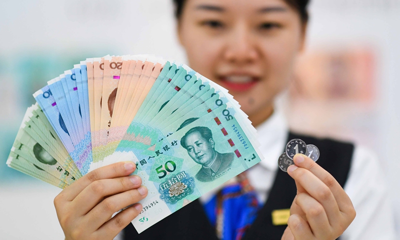 The yuan strengthened 79 basis points to 6.7000 against the US dollar