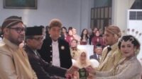050114800-1719021288-830-556 Keponakan Menikah di Solo Jokowi Jadi Saksi