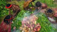 yrywybmlqiy4v4n Beginilah Tradisi "Bakar Batu" Papua yang Sarat Makna Kebersamaan